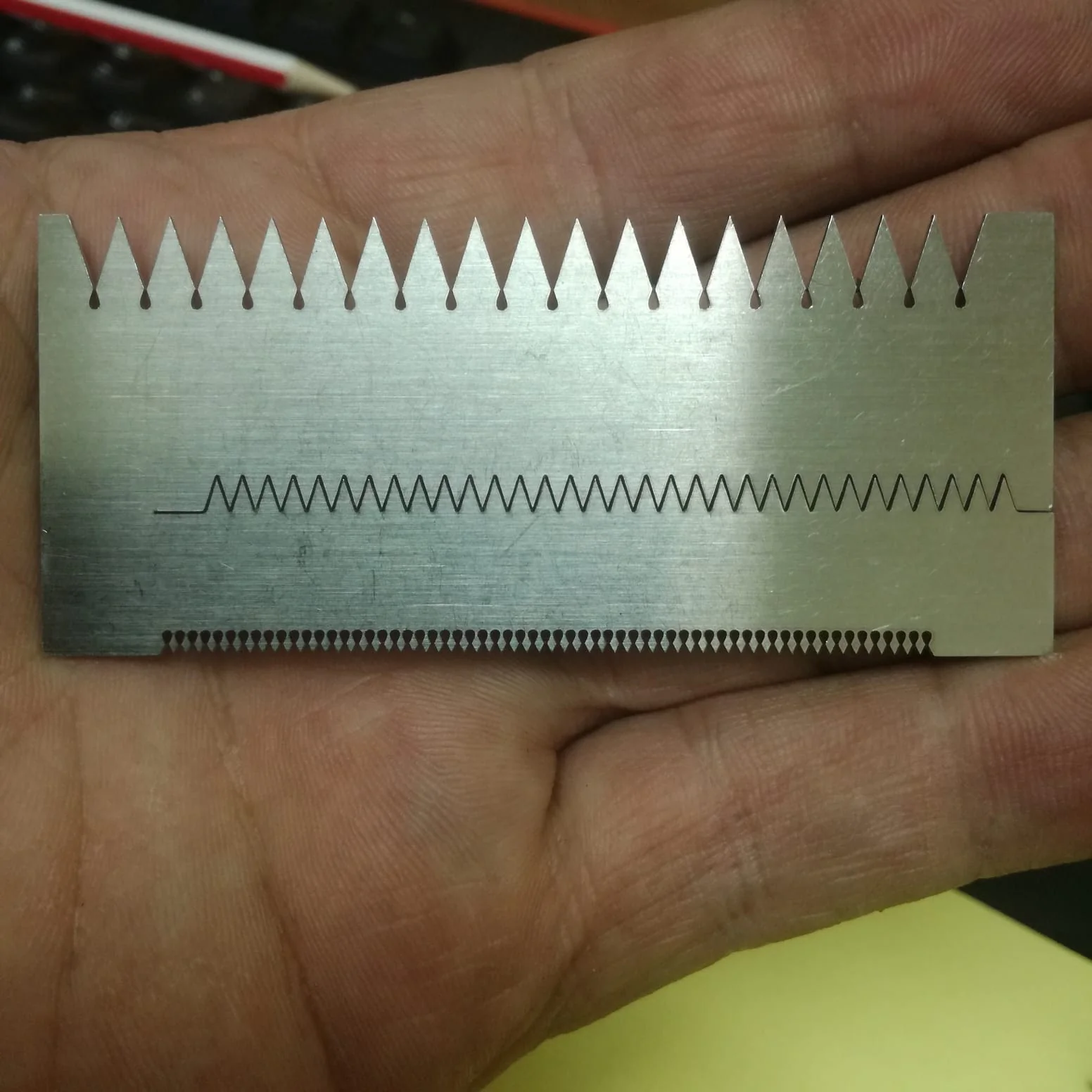 Industrial fibre laser cutting machine producing clean precise cuts on metal sheets
